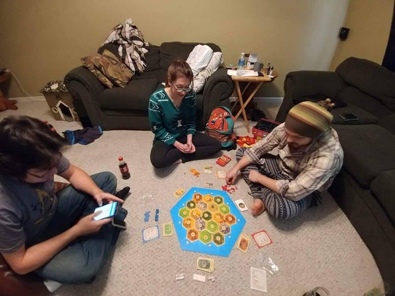 Playing Catan with Shaun and Terrence. I was determined to win this time for sure- but Shaun ended up winning because we forgot to explain one of the rules to him! xD