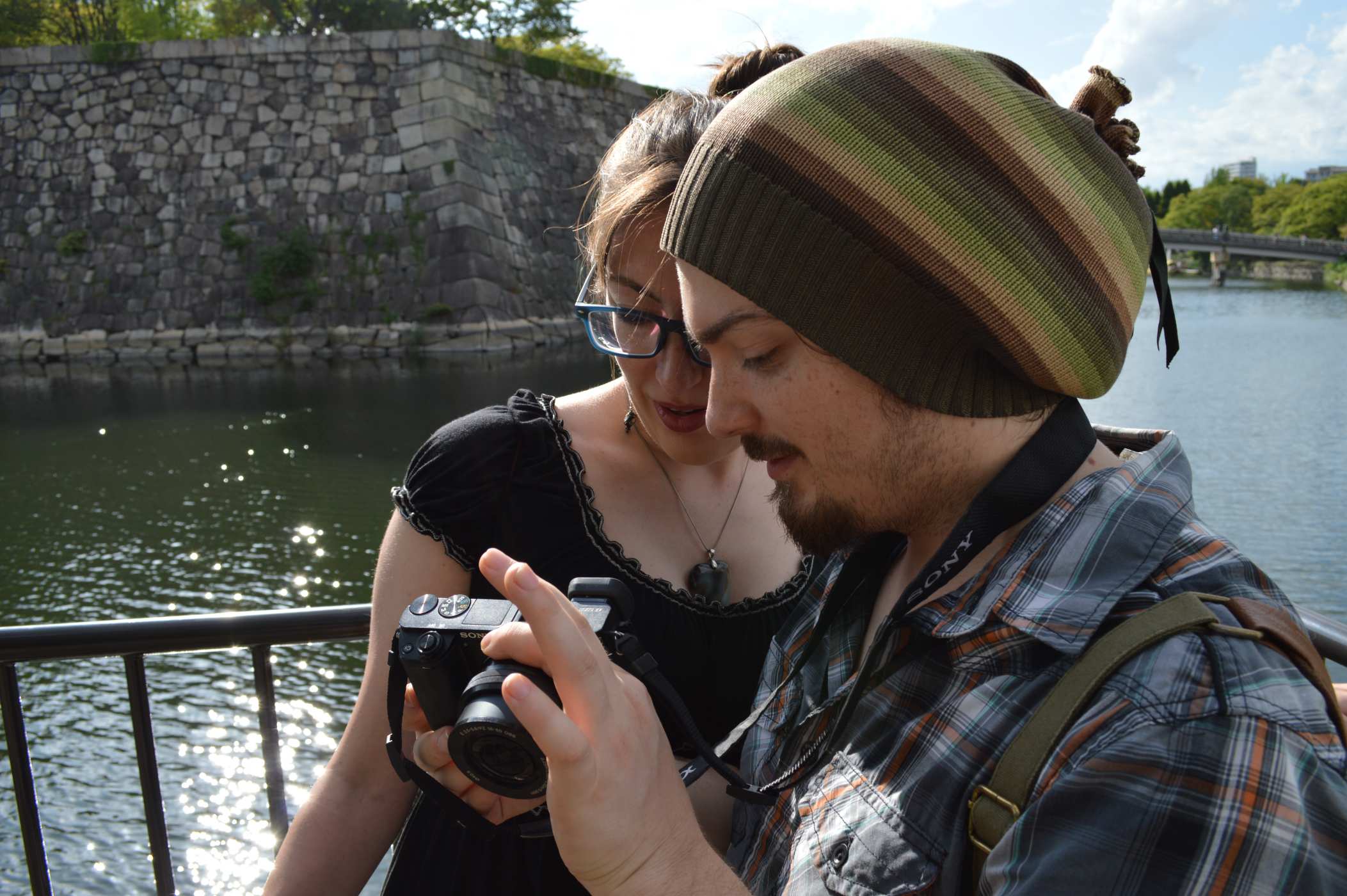 Checking out the pics at Osaka Castle